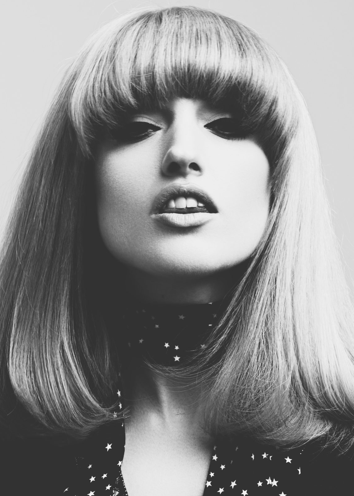 Black and white heavy-fringe blunt bob