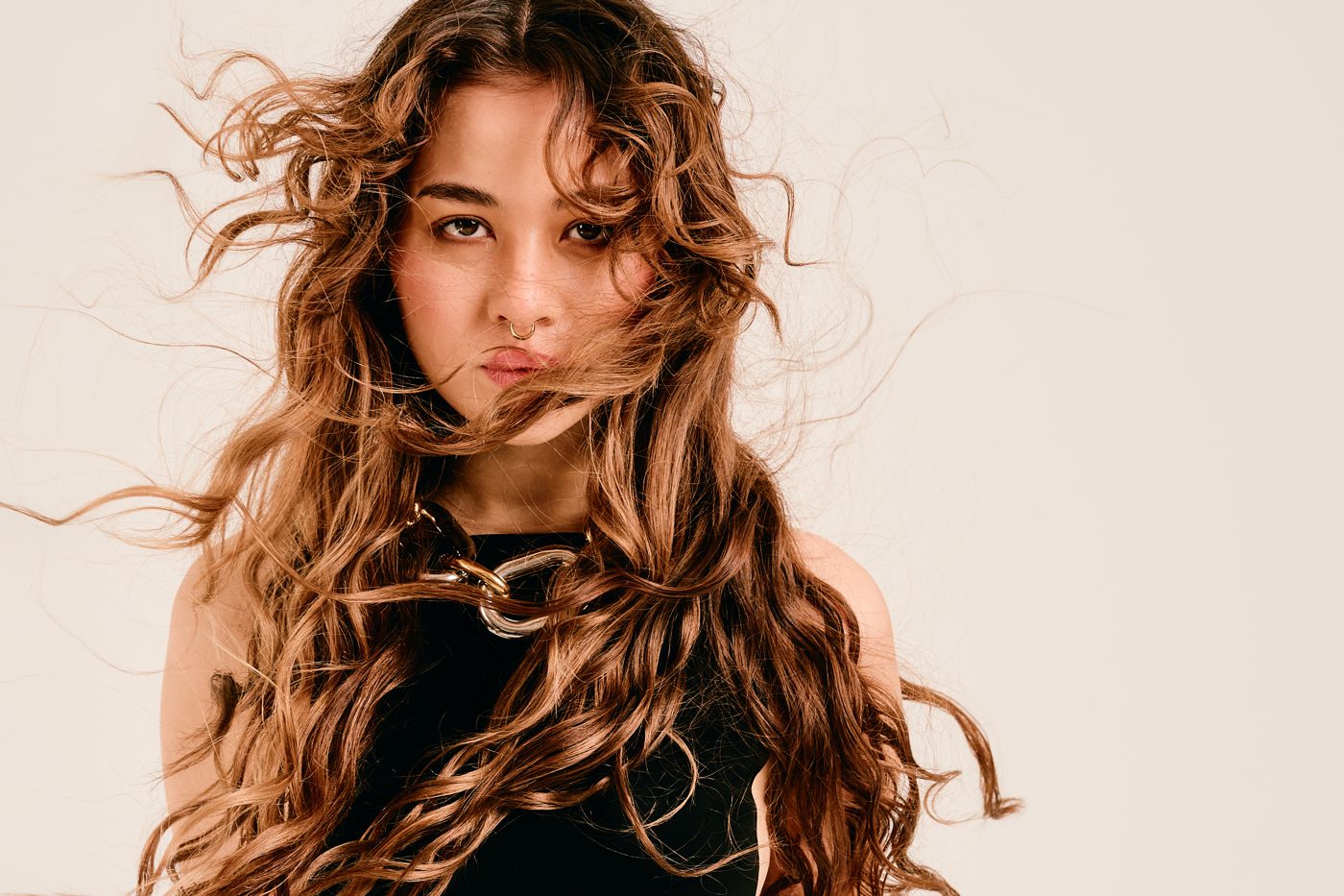 Long wind-blown natural curls